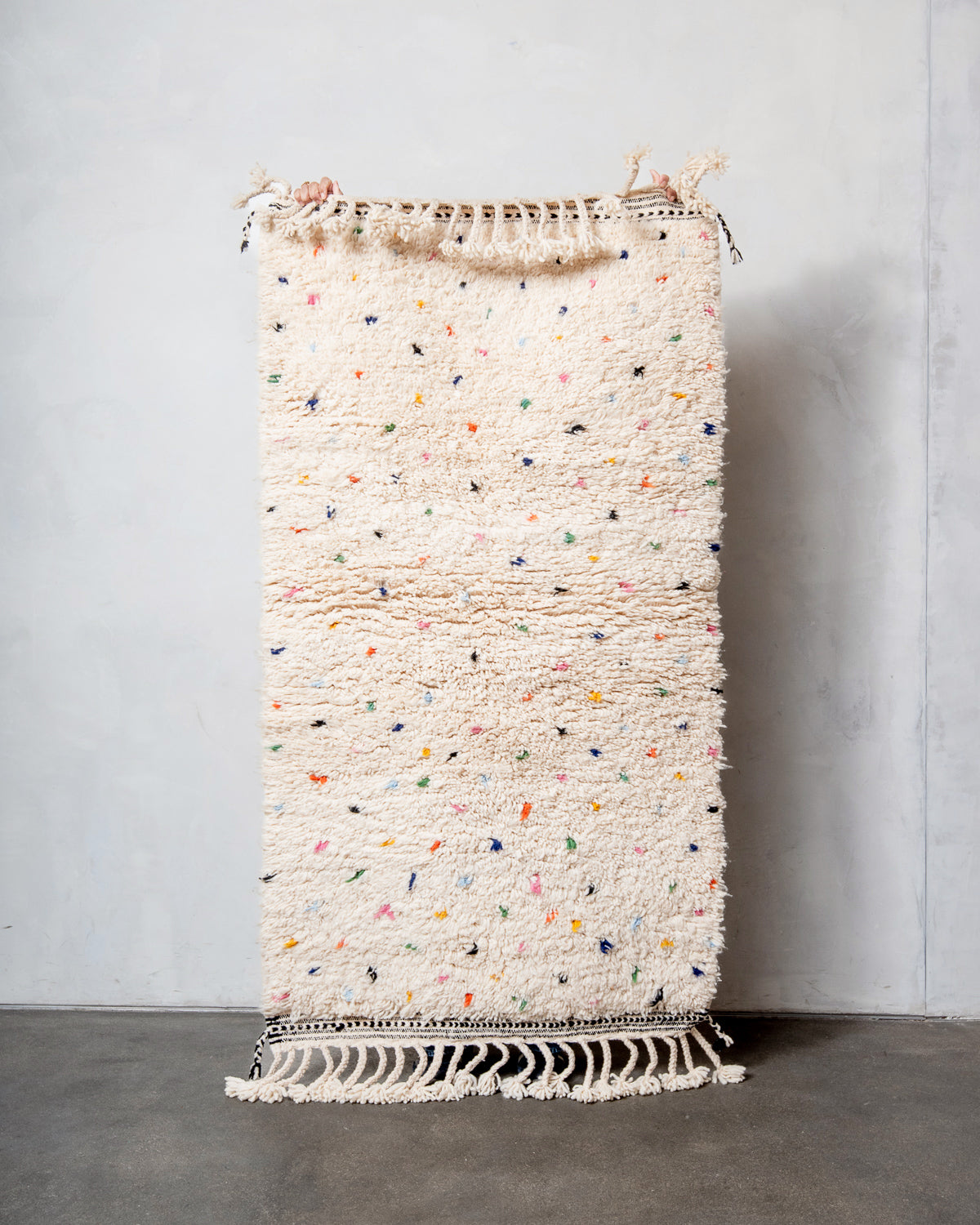 Modern, designer, handcrafted Berber rug from Morocco. Beniourain carpet with beautiful colours and patterns and fluffy wool texture.